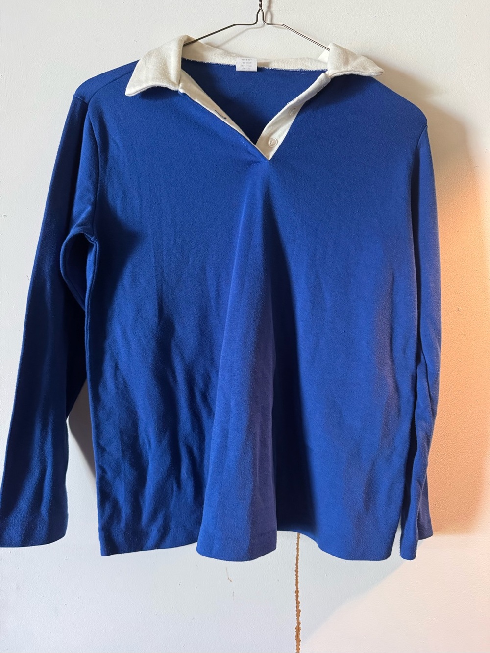 Long-Sleeve Blue Polo-Style Top with White Collar
